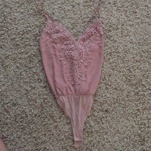 Light pink stylish body suit
